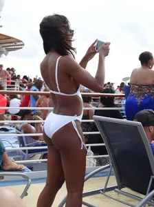 Sexy Ebony babe on a cruise in white bikini