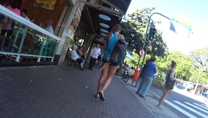 Skinny sexy girl buying ice cream in tight spandex shorts with a nice ass, gap, and camel toe