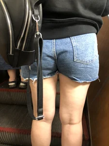 Hot Booty In Blue Jean Shorts And Chunky Legs Creepshots Gallery on a Subway Escalator