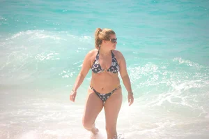Various sexy candid girls in bikinis at the beach