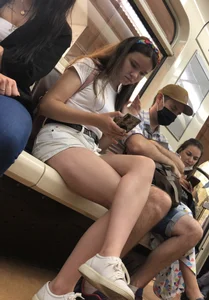 Cute Teen Girl in Shorts in Subway Train Candid Photos