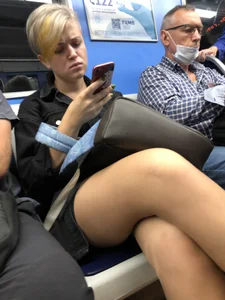 Sexy Candid Blonde With a Short Haircut in Pantyhose and a Skirt - Subway Train Legs Closeups Gallery