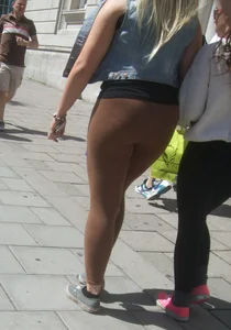 Thick blonde showing her panties in see through leggings