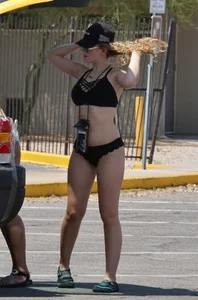 Girls in bikinis getting ready for tubing