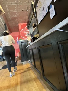 Big ass girl In tights at cafe