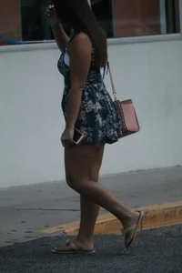 Thick girl in romper shorts going into TJ Maxx gives a cheek peak