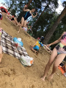 Girls in One-Piece Body Swimsuits Running Towards Water and Swimming - Beach Photo Gallery