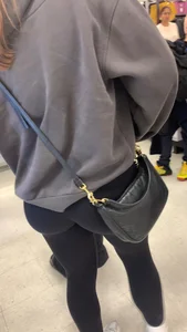 Perfect round ass showing off her long socks and black leggings