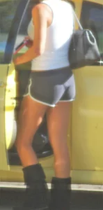 Skinny babe going to her car in little cotton shorts
