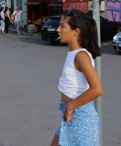 Skinny girl wearing shorts on the street