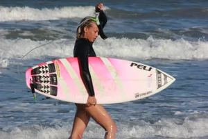 Hot surfer chicks out in the water