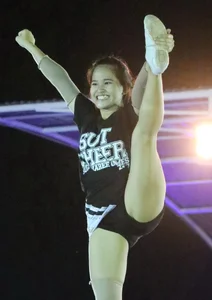 Bunch of athletic Thai cheerleaders at a competition