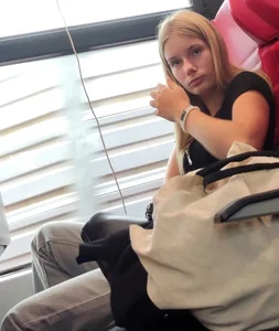 Hot busty blonde on train