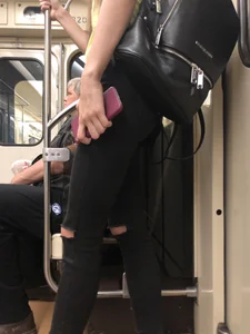 Skinny Candid Girl With Slim Legs in Torn Black Jeans - Subway Train Creepshots