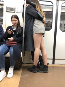 Girl in Shorts Hugging in the Subway Train Candid Photo - Hot Long Legs