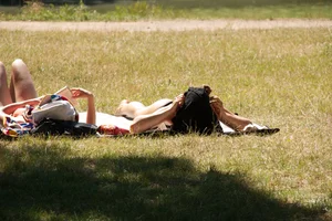 Creepshots of some girls in the park getting some sun in bikinis