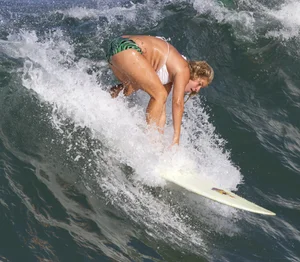 Candid surfer babes on the beach and in bikinis
