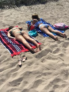 Two Hot Candid Girls in Swimsuits Lying on the Beach Creepshot