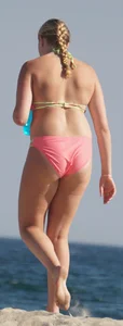 Thick blonde bikini babe on the beach