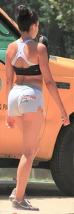 Ebony babe in Hooters shorts out for a run and walk
