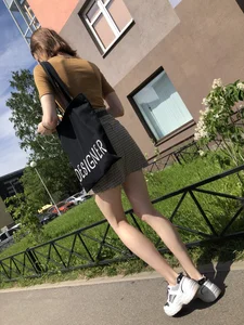 Candid Girl in a Skirt With Very Thin Hot Legs Walking on a Street Creepshots