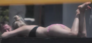 Resort Tan in pink bikini