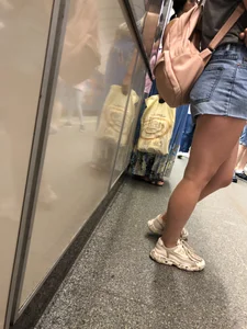 Girl with Hot Muscular Legs in Jeans Shorts Subway Creepshots