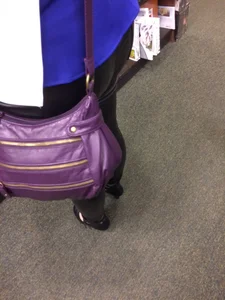 Ass in Tight Pants Closeup at the Store