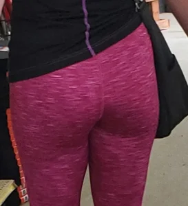 Milf shopping with a nice ass in tight maroon leggings