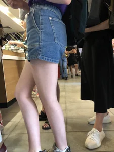 Hot Bare Legs in Blue Denim Shorts Closeup Candid Pics Gallery in the Cafe Line