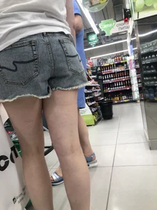 Awkward Candid Teen Girl in Jean Shorts And Sneakers at the Supermarket Creepshots Gallery