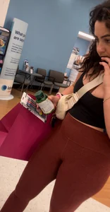 Cute girl in maroon leggings w cleavage