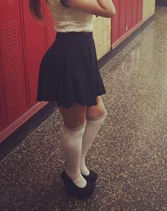Cute Teen in a Skirt and Knee-Socks on High Heels Creepshot