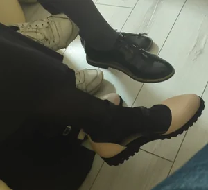 Closeups of a Candid College Teen's Feet in Black Pantyhose And Boots, Sitting in Class