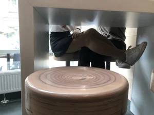 Girl in a Skirt and Pantyhose Touching Herself Under a Table at a Restaurant Creepshots Collection