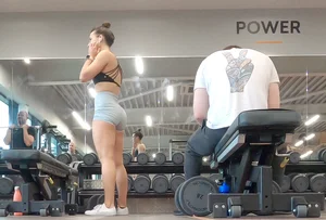 Gym brunette in tight grey shorts bending over, part 3