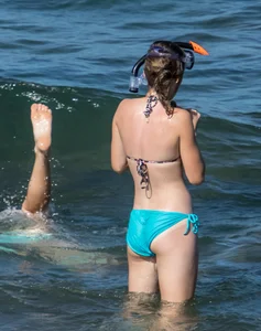 Another sexy girl on the beach snorkeling