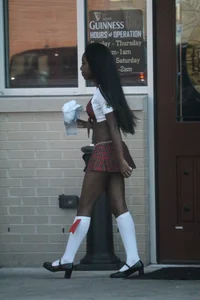 Sexy ebony Tilted Kilt employee in her uniform