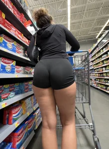 Latina with slight VPL in shorts- OC