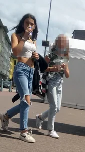 Hot teen in a crop top and ripped jeans street creepshots