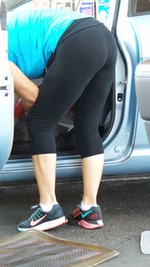 Girl in tight see through leggings with nice ass cleaning her car