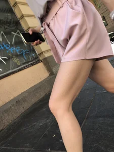 Cute candid girl in pink shorts street photos
