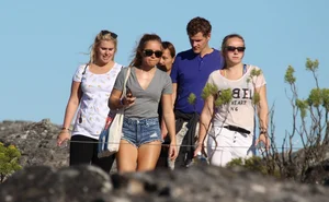 Sexy tourist in short jean shorts showing cheeks