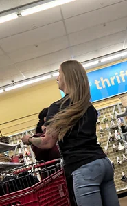 Girl with tattoos in tight jeans