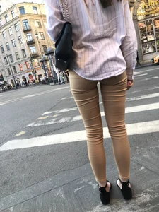 Nice legs and booty in brown tight pants