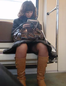 Sexy girls in skirts, stockings and upskirts on the train