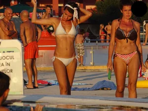 Sexy bikini babe in a white bikini at the pool with camel toe