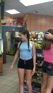 Candid Teen in Shorts Store Photo