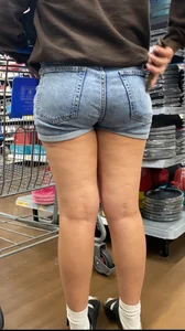 Cutie in shorts. Lil booty sits nicely