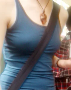 Braless babe in tank top with puffy pokies